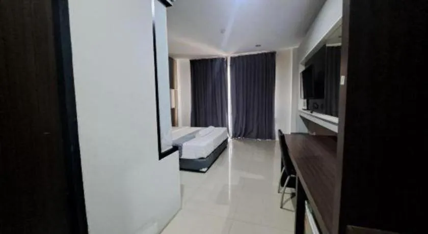 Bed in S-Tawan Hotel & Convention