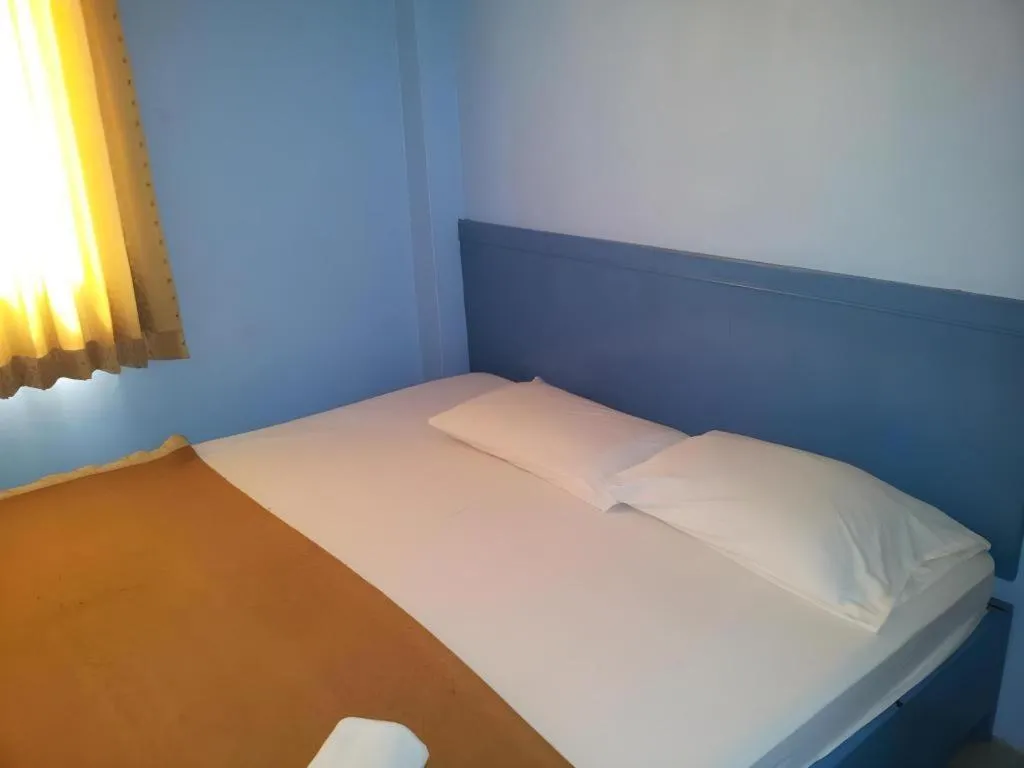 Bed in Centaur Inn Hotel