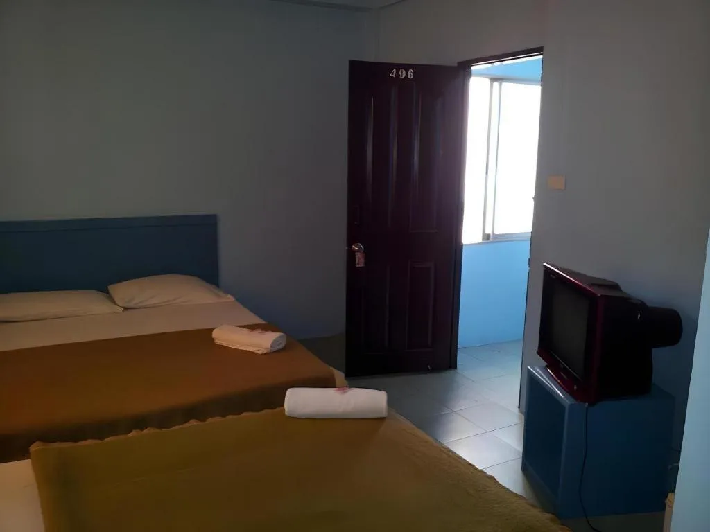 Bed in Centaur Inn Hotel