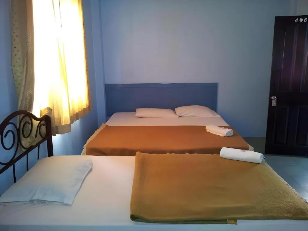 Bed in Centaur Inn Hotel