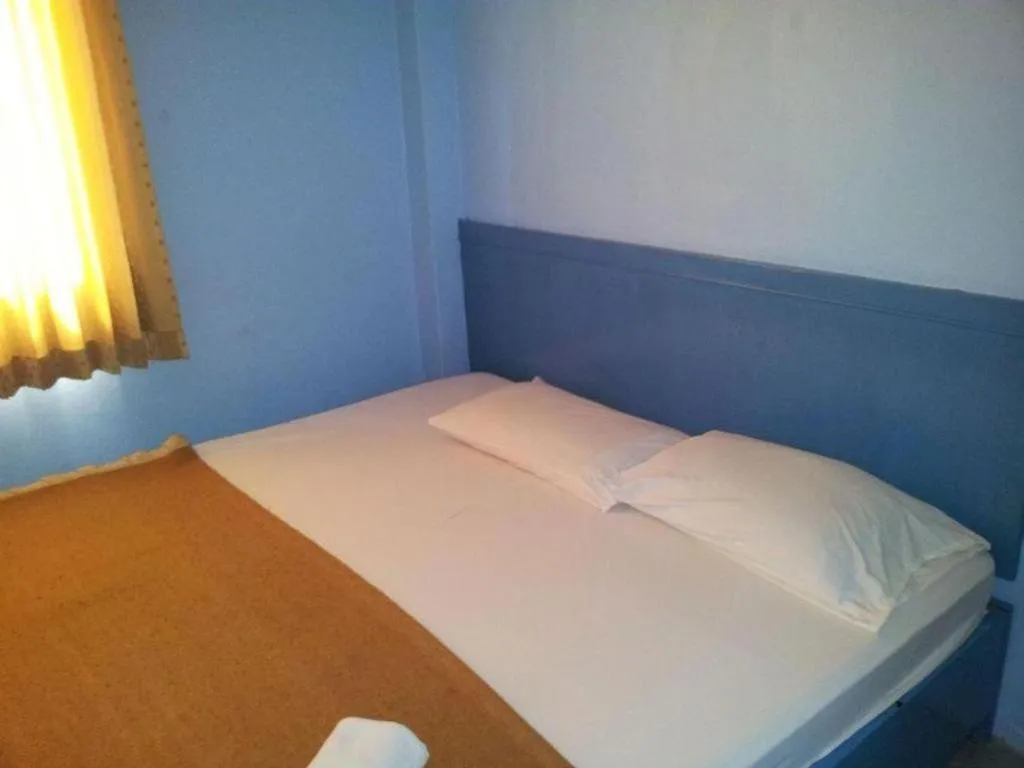 Bed in Centaur Inn Hotel