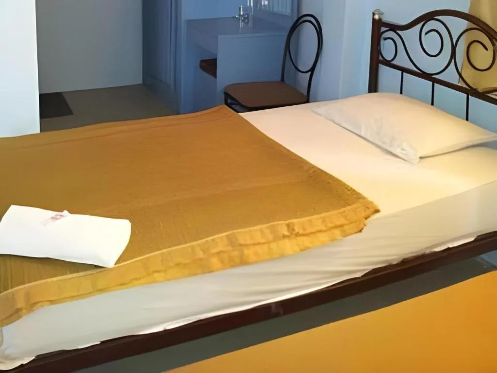 Bed in Centaur Inn Hotel