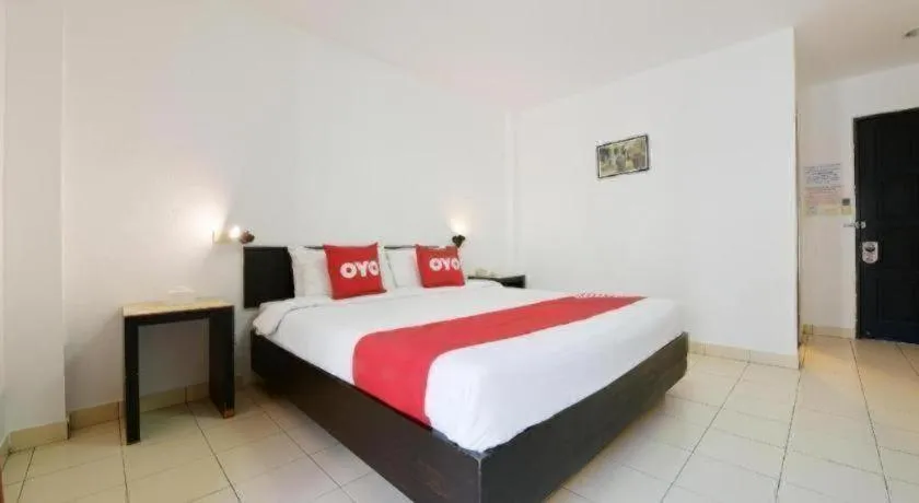 Bed in OYO 520 Pattaya Cantina