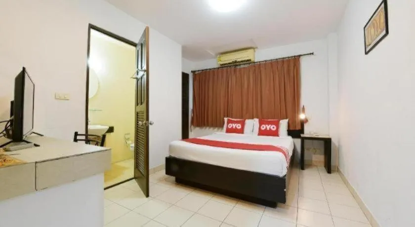 Bed in OYO 520 Pattaya Cantina