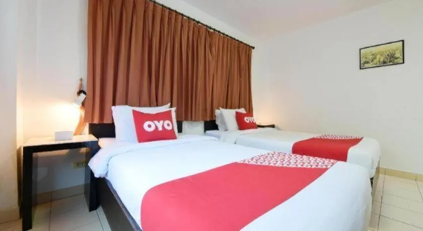 Bed in OYO 520 Pattaya Cantina