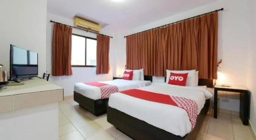 Bed in OYO 520 Pattaya Cantina
