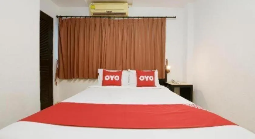 Bed in OYO 520 Pattaya Cantina