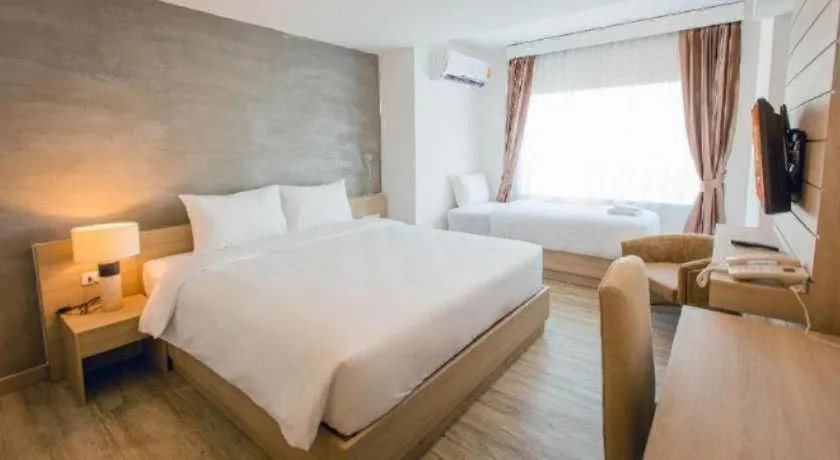 Bed in B2 Nakhonsawan Premier Hotel