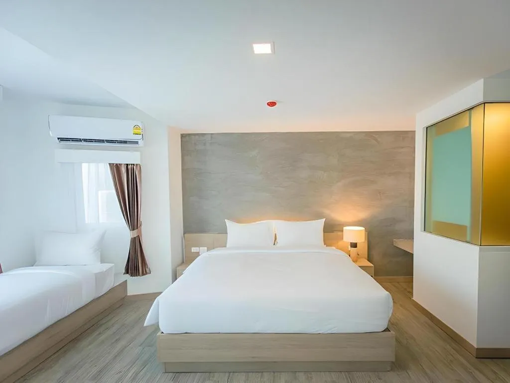 Bed in B2 Nakhonsawan Premier Hotel