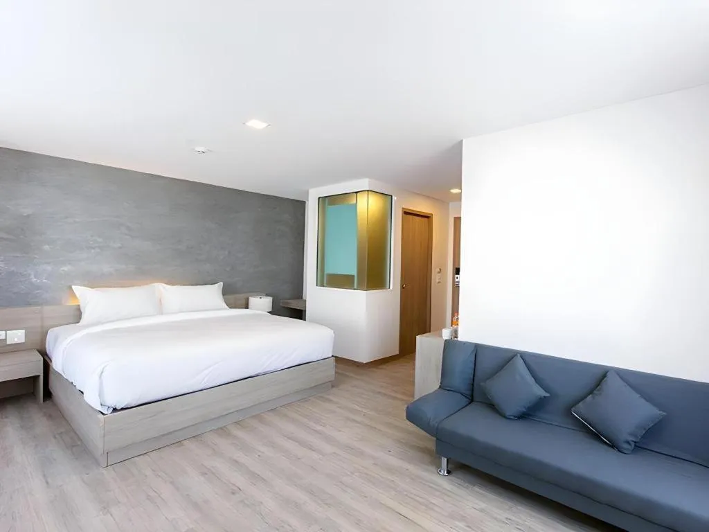 Bed in B2 Nakhonsawan Premier Hotel