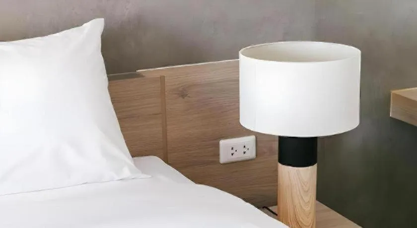 Bed in B2 Nakhonsawan Premier Hotel