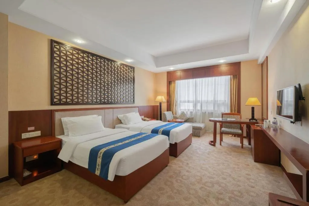 Bed in Longyan Capital International Hot Spring Resort