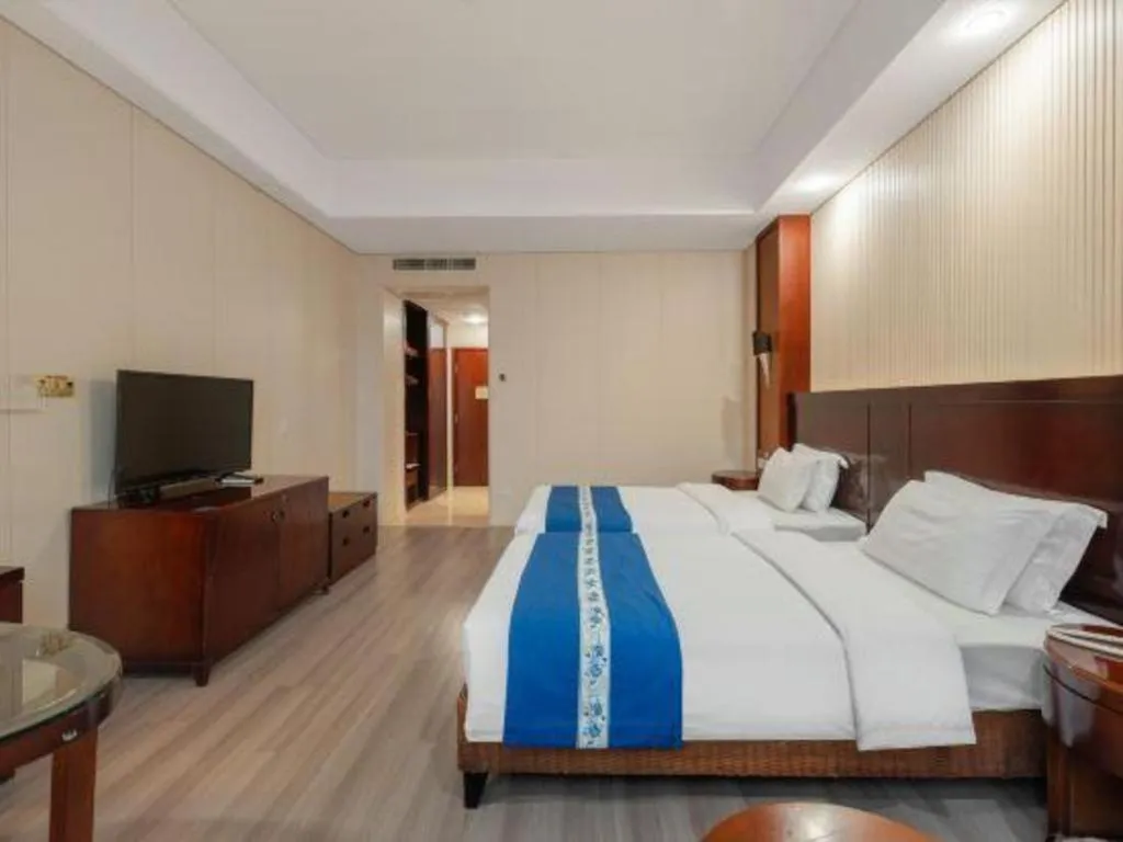 Bed in Longyan Capital International Hot Spring Resort