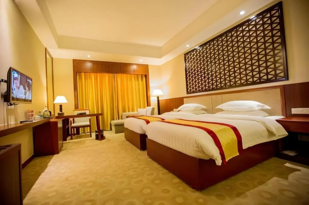 Bed in Longyan Capital International Hot Spring Resort