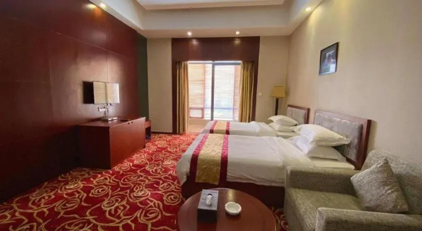 Bed in Longyan Capital International Hot Spring Resort