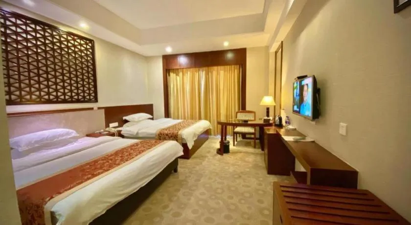 Bed in Longyan Capital International Hot Spring Resort