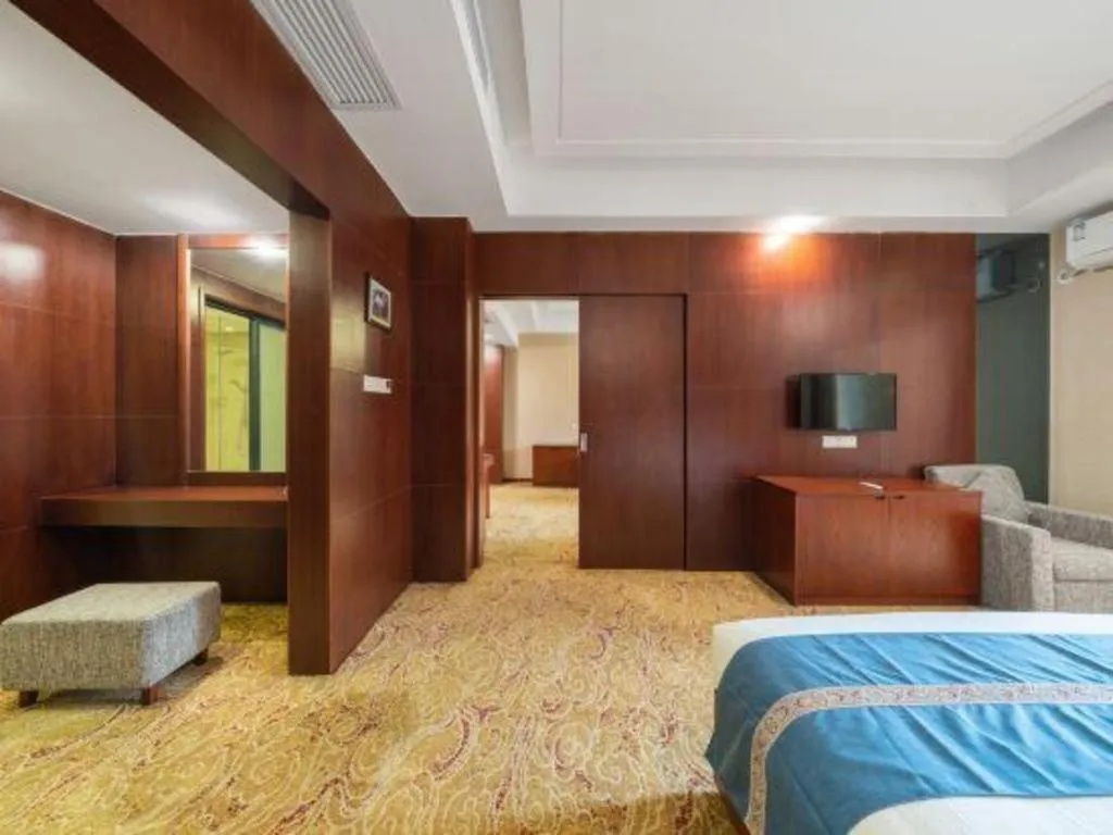 Bed in Longyan Capital International Hot Spring Resort