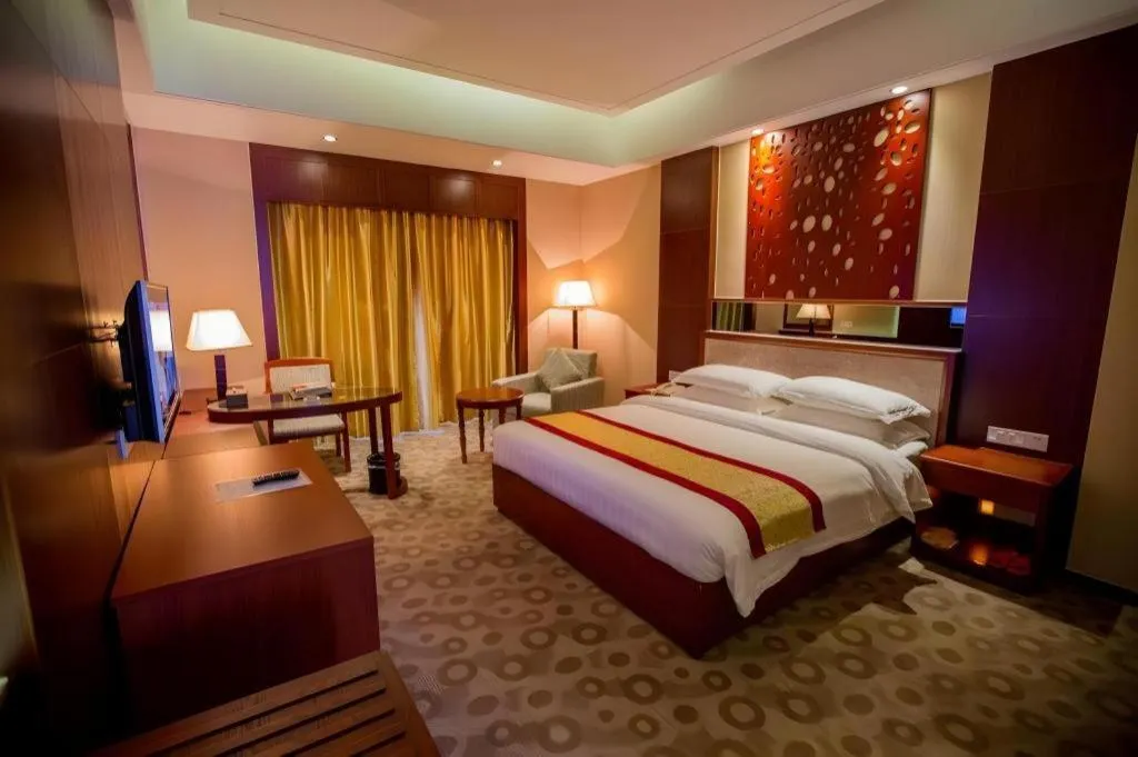 Bed in Longyan Capital International Hot Spring Resort