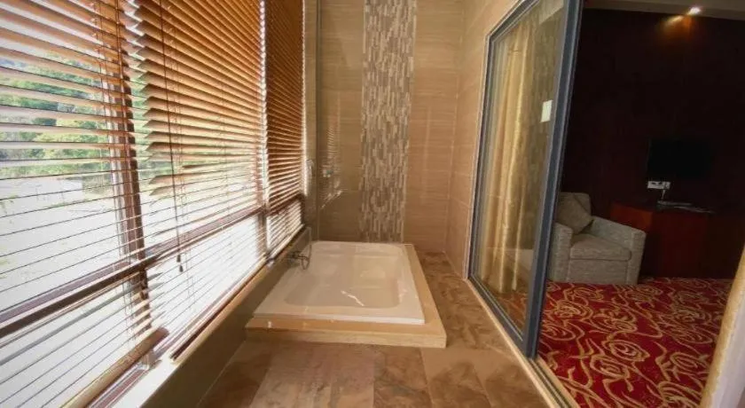 Bed in Longyan Capital International Hot Spring Resort