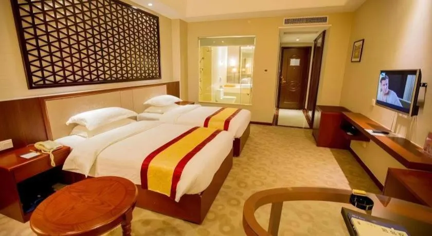 Bed in Longyan Capital International Hot Spring Resort