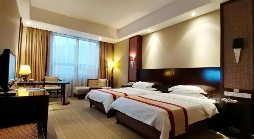 Bed in Longyan Capital International Hot Spring Resort