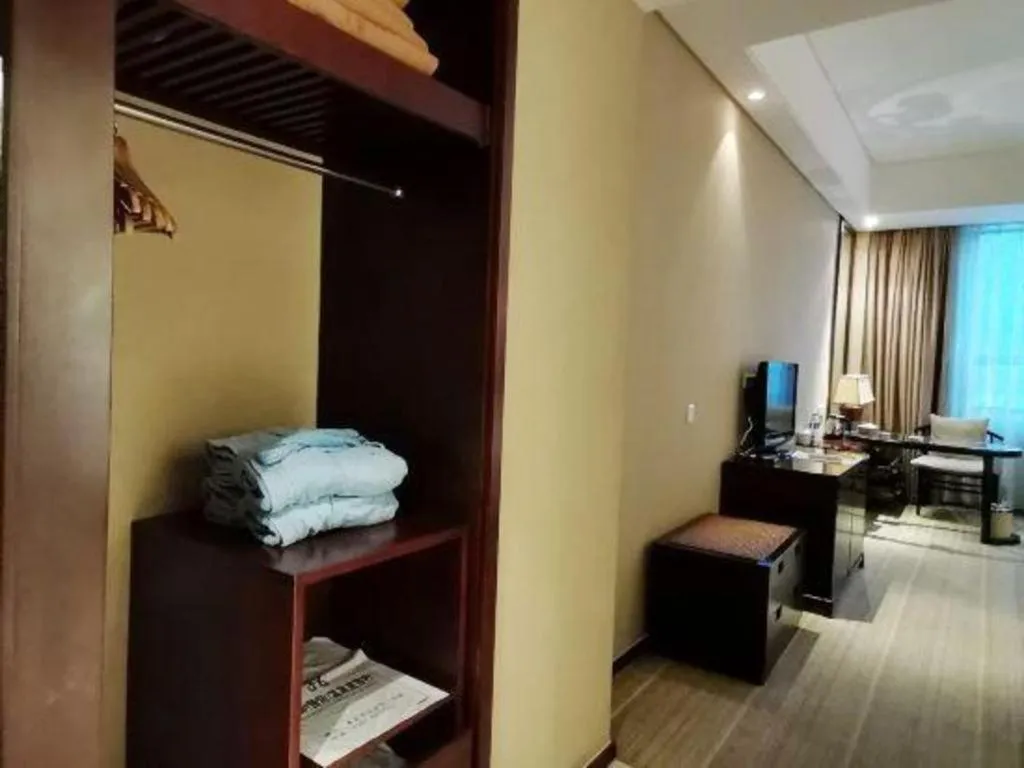 Bed in Longyan Capital International Hot Spring Resort