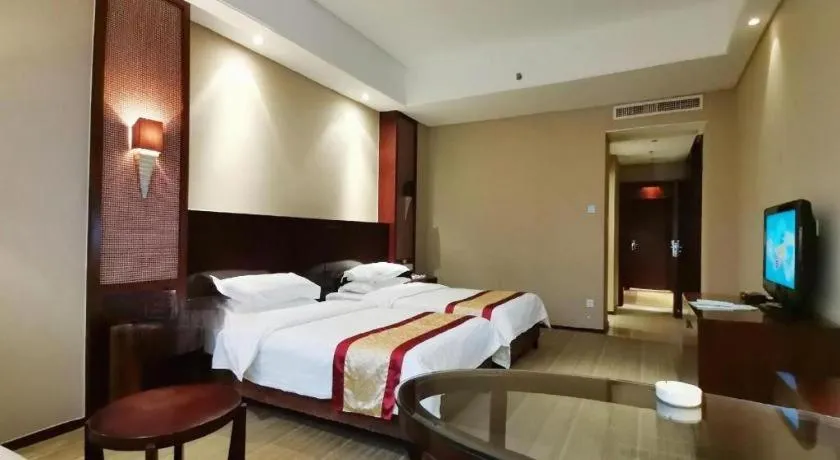 Bed in Longyan Capital International Hot Spring Resort