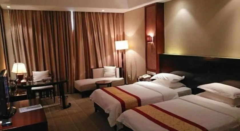 Bed in Longyan Capital International Hot Spring Resort