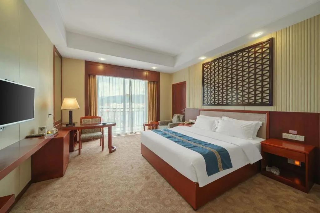 Bed in Longyan Capital International Hot Spring Resort