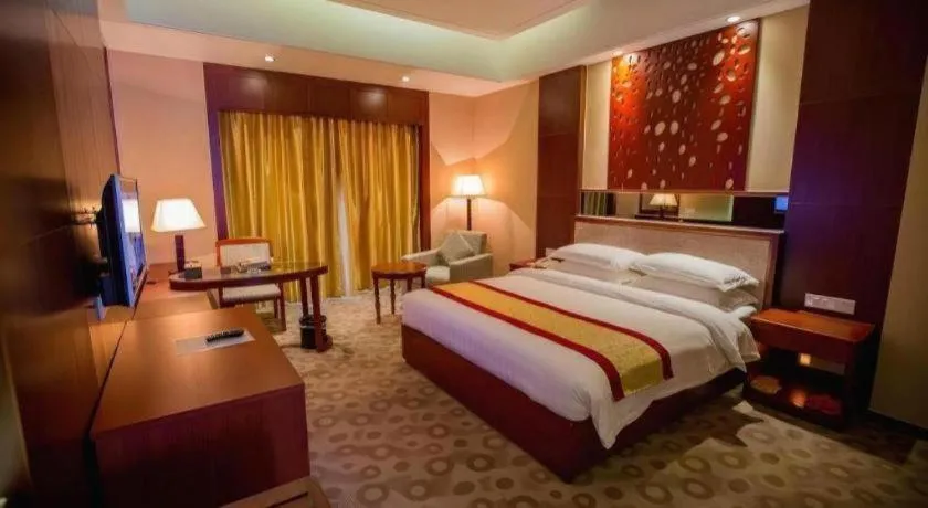 Bed in Longyan Capital International Hot Spring Resort
