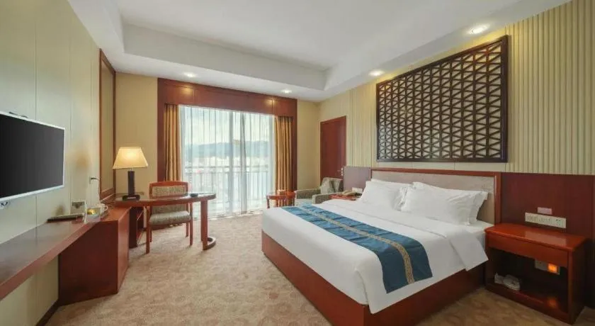Bed in Longyan Capital International Hot Spring Resort