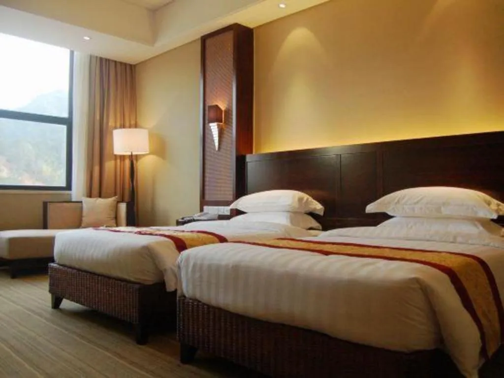 Bed in Longyan Capital International Hot Spring Resort