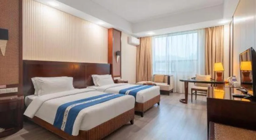 Bed in Longyan Capital International Hot Spring Resort