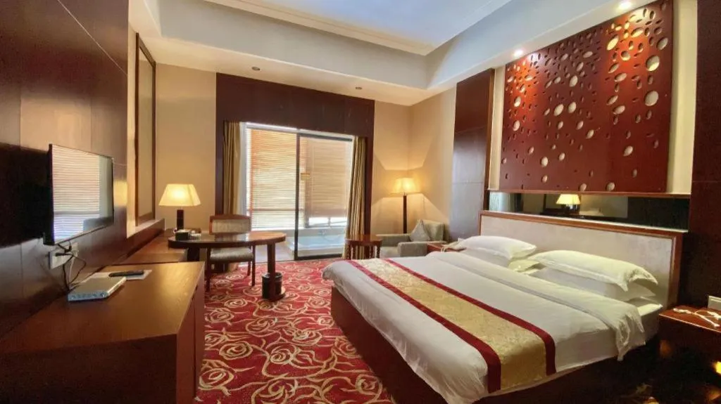 Bed in Longyan Capital International Hot Spring Resort