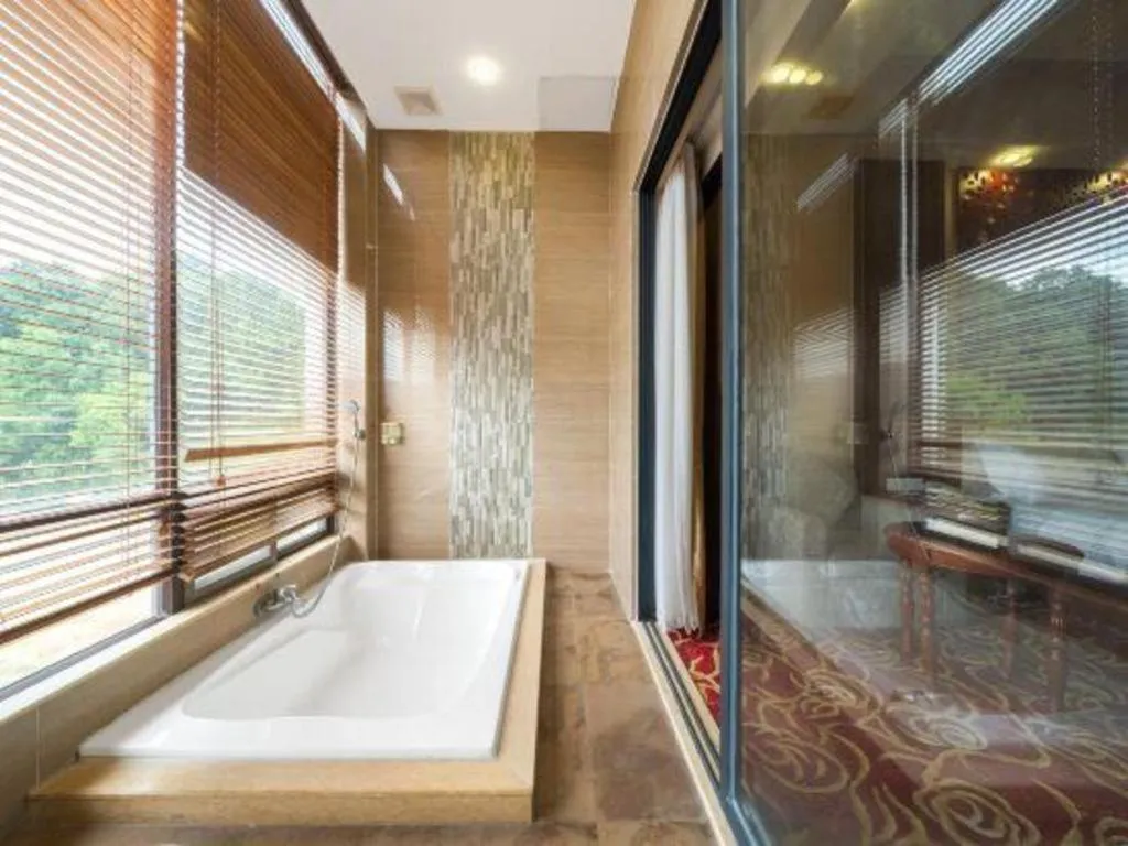 Bed in Longyan Capital International Hot Spring Resort