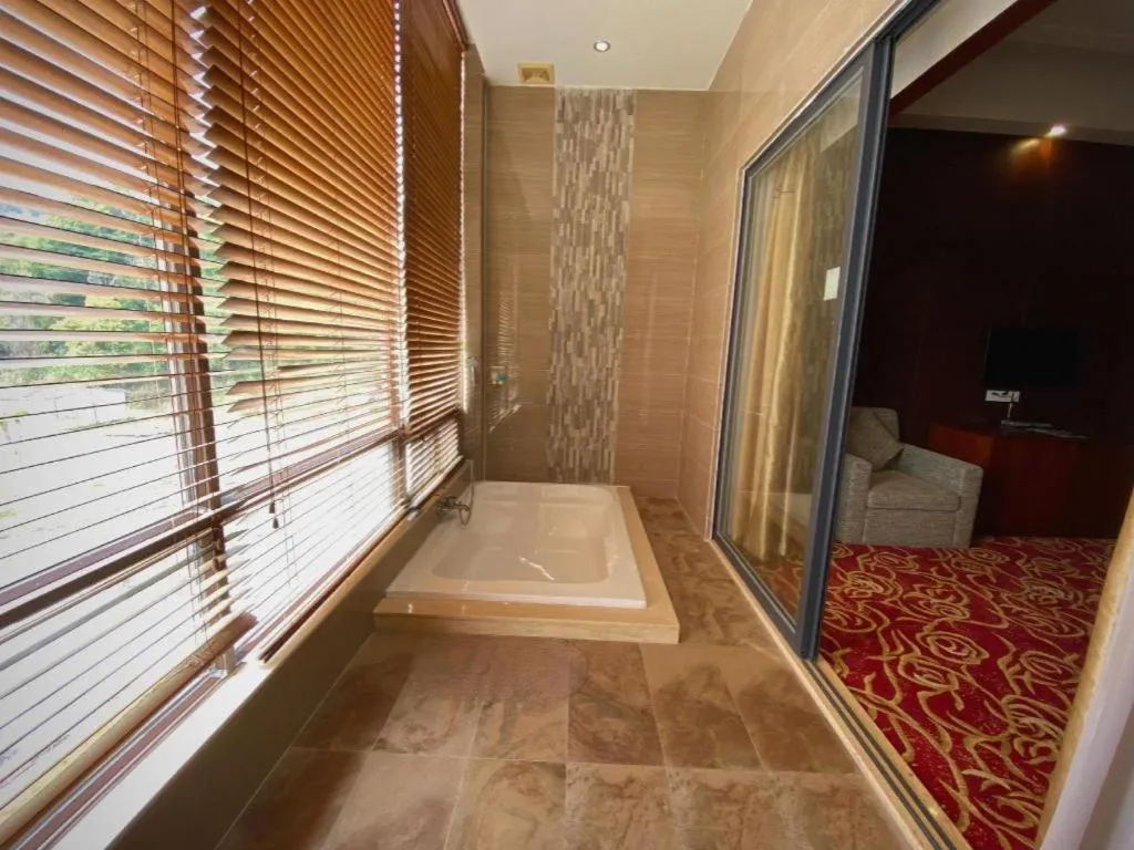 Bed in Longyan Capital International Hot Spring Resort