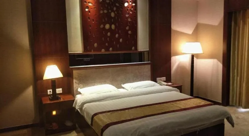 Bed in Longyan Capital International Hot Spring Resort