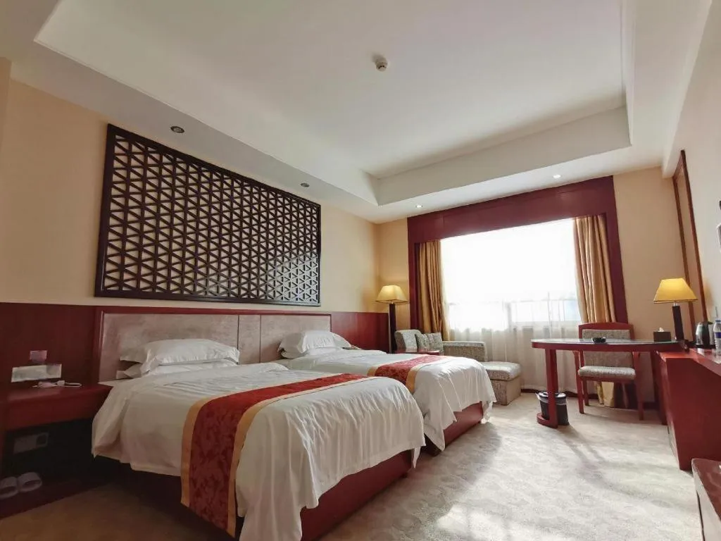 Bed in Longyan Capital International Hot Spring Resort