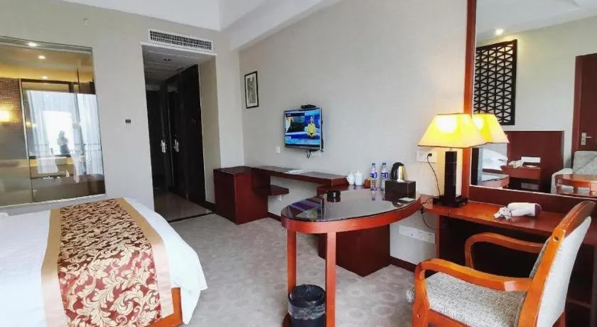 Bed in Longyan Capital International Hot Spring Resort