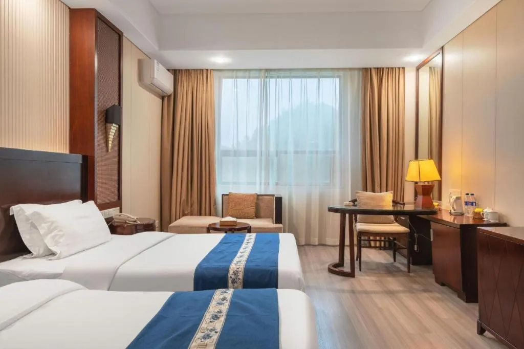 Bed in Longyan Capital International Hot Spring Resort