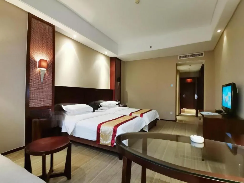 Bed in Longyan Capital International Hot Spring Resort