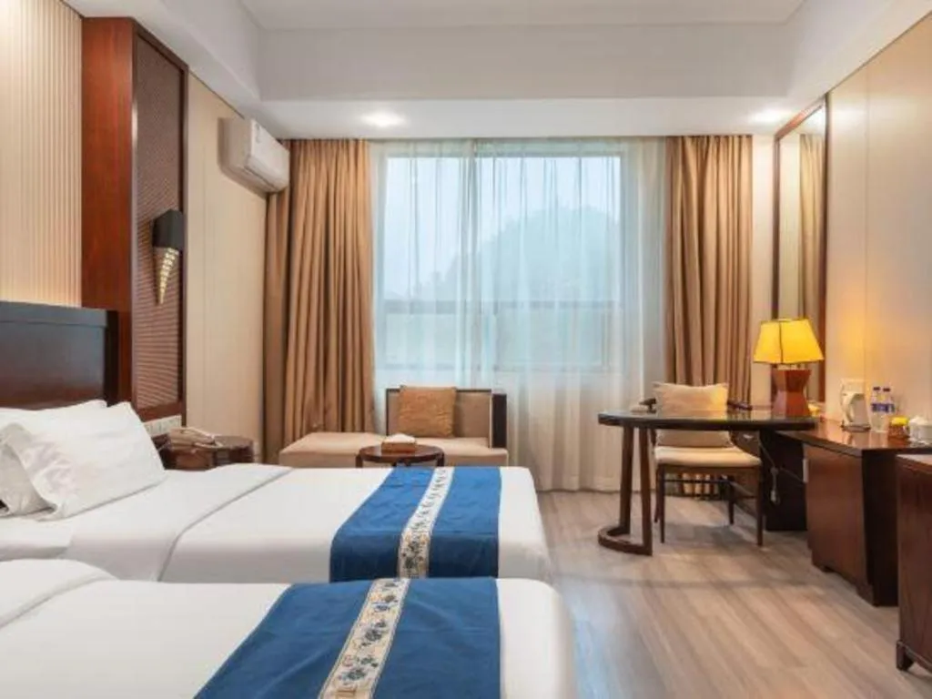 Bed in Longyan Capital International Hot Spring Resort