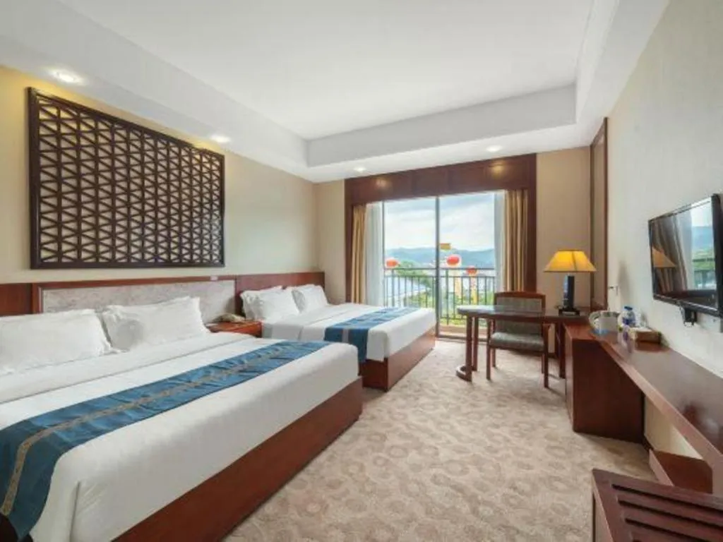 Bed in Longyan Capital International Hot Spring Resort