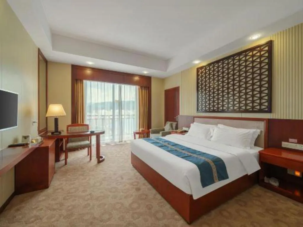 Bed in Longyan Capital International Hot Spring Resort