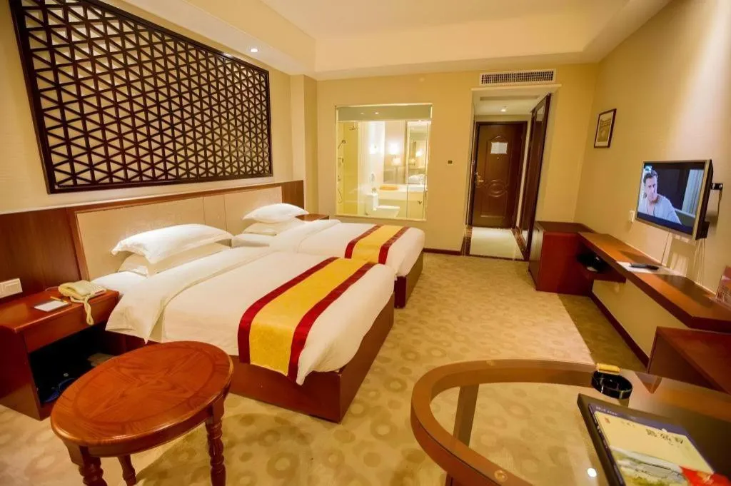 Bed in Longyan Capital International Hot Spring Resort