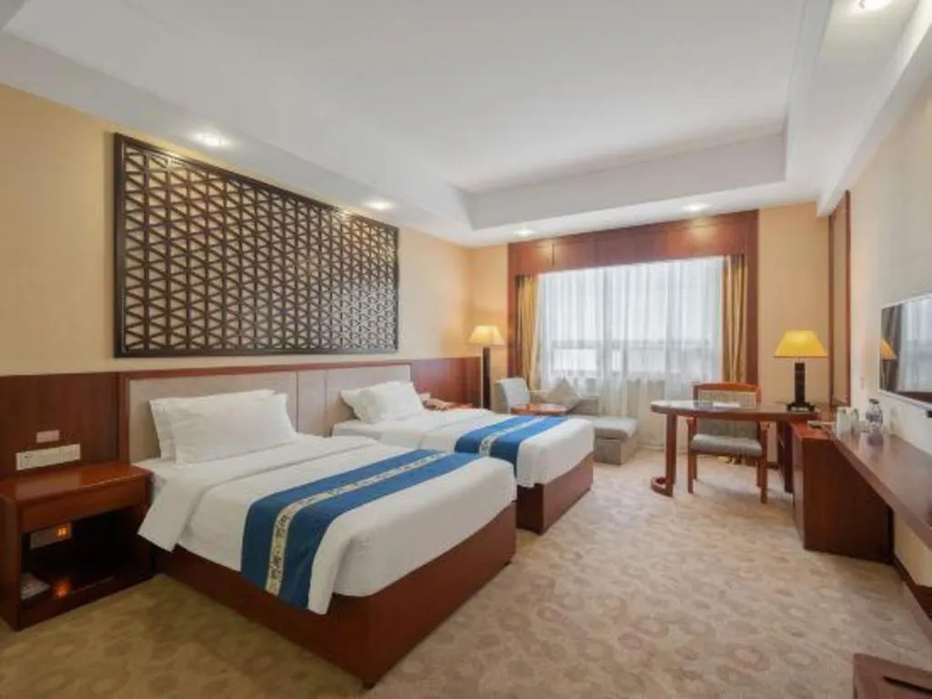 Bed in Longyan Capital International Hot Spring Resort