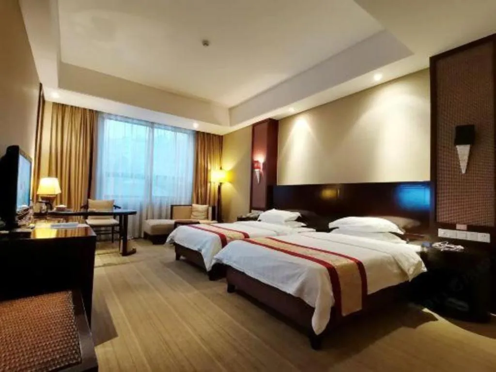 Bed in Longyan Capital International Hot Spring Resort