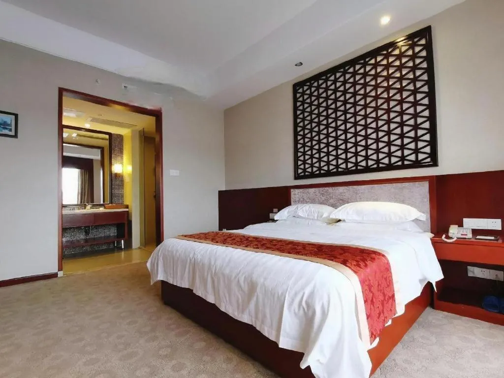 Bed in Longyan Capital International Hot Spring Resort