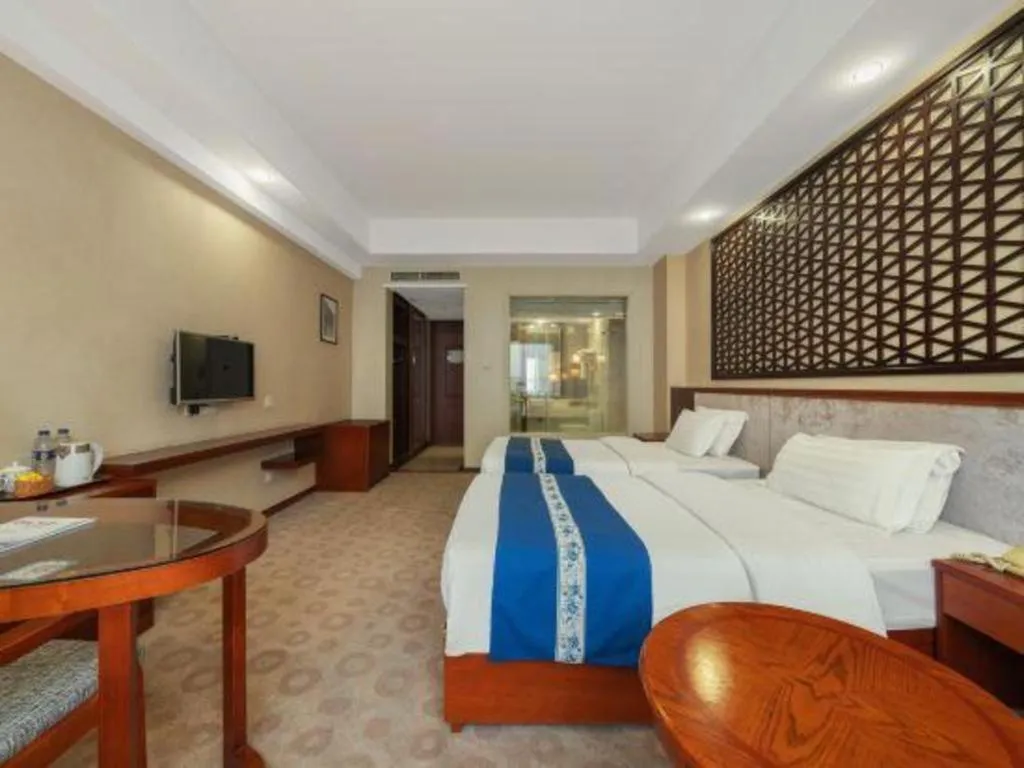 Bed in Longyan Capital International Hot Spring Resort