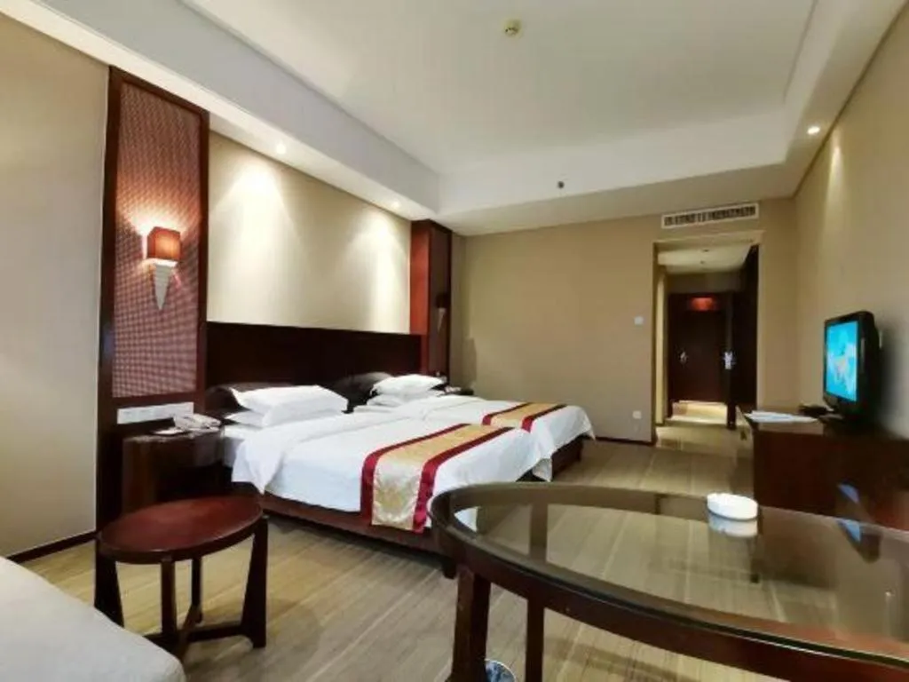 Bed in Longyan Capital International Hot Spring Resort